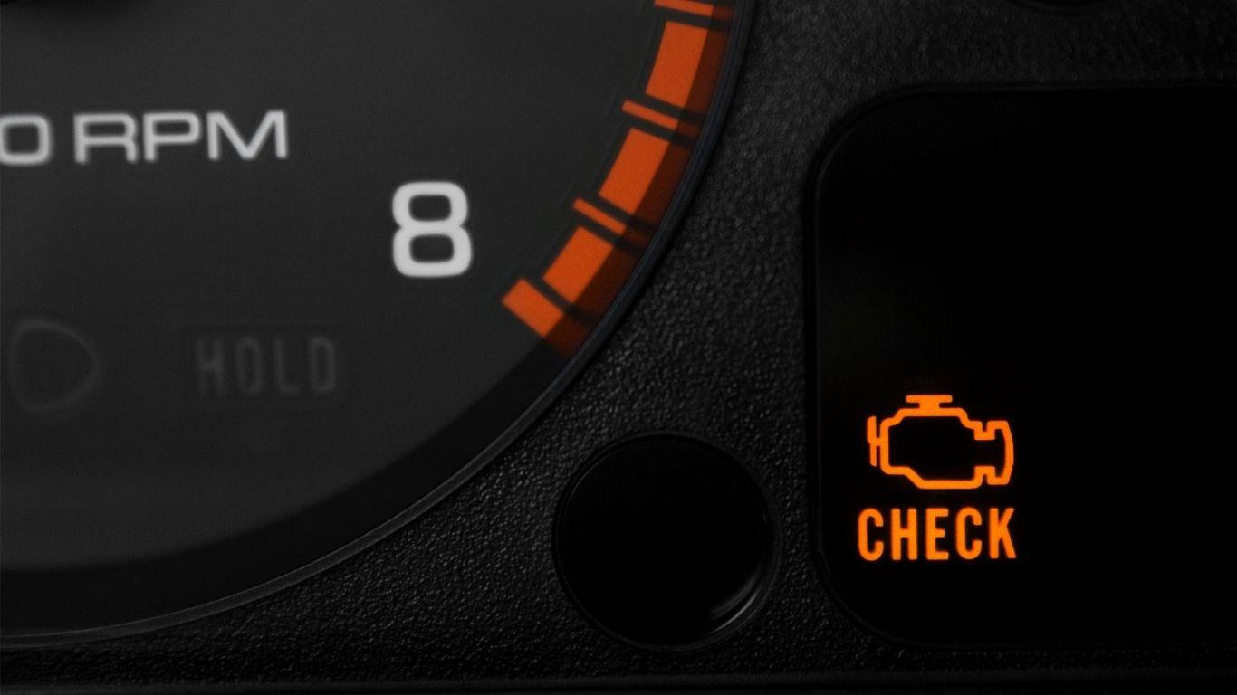 BMW dashboard with rising temperature gauge indicating overheating
