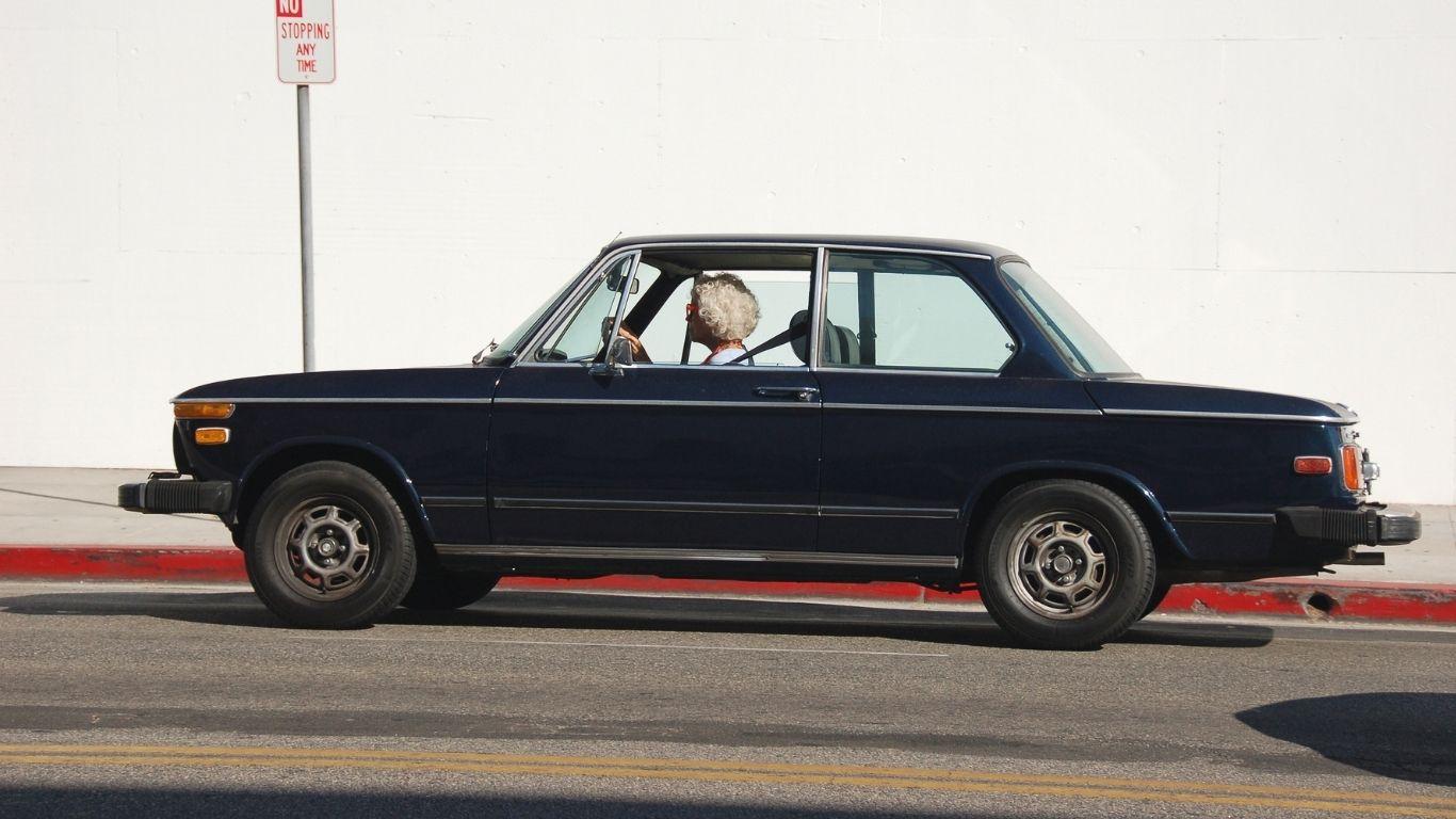 ### Main Subject - Classic Car ### Notable Features - Vintage design with a two-door