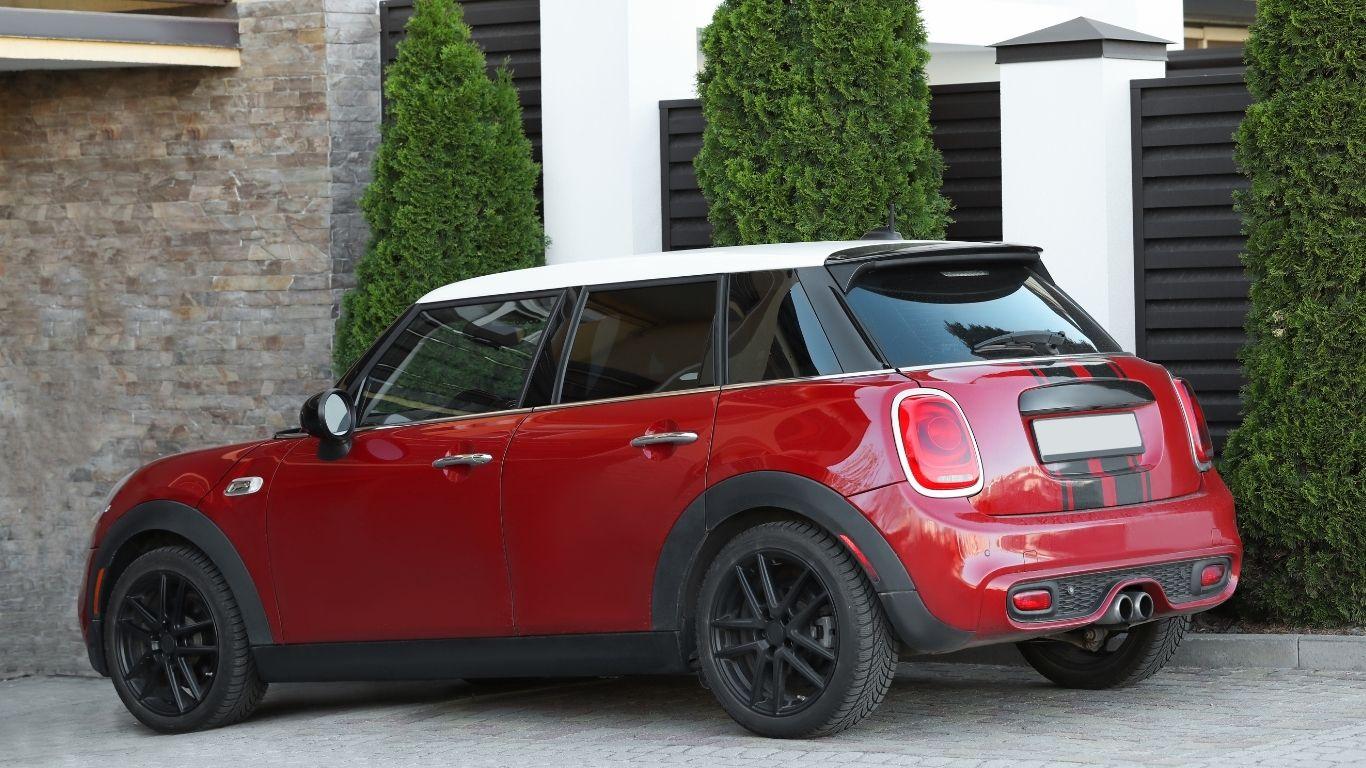 ### Key Elements #### Main Subject - A red Mini Cooper car. #### Notable Features